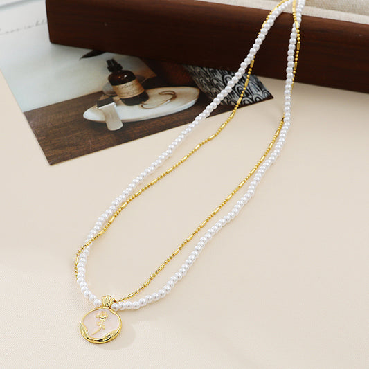 Cross border French vintage rose pendant pearl versatile stacking necklace female niche flower clavicle chain drip oil jewellery